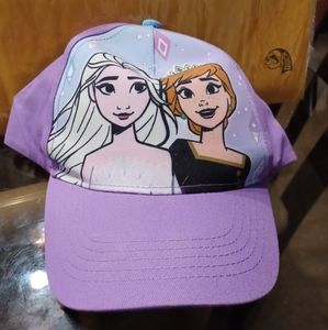 A BEAUTIFUL NEW DISNEY ADJUSTABLE FROZEN 11 HAT .